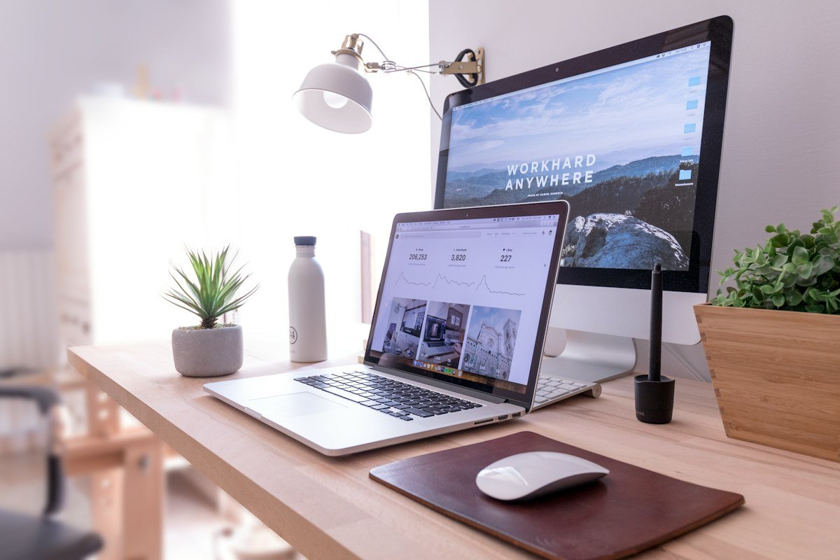 Laptop displaying a modern website design workspace
